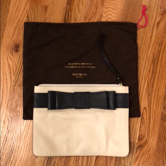 kate spade Handbags - Kate Spade Creme w/ Navy Bow Large Clutch Bag